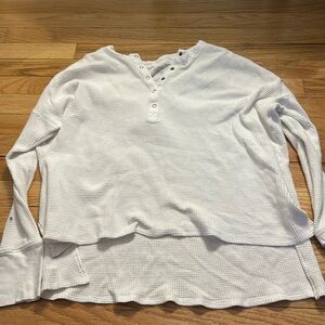aerie button long sleeve, the back is longer than the front by a little